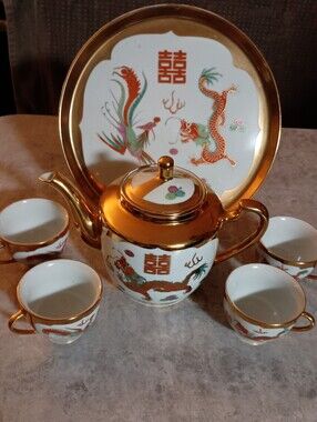 Gold-Trim Porcelain Teapot and Cup Set with Dragon and Phoenix Motif